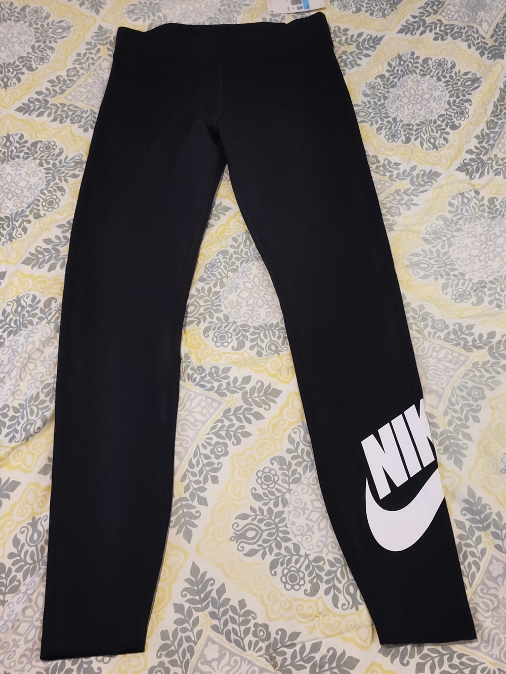 NWT! Nike Ladies Black Leggings with White Logo In Size Medium